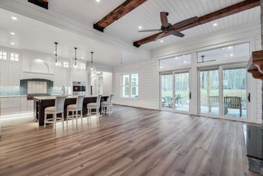 a large open living room with a fireplace